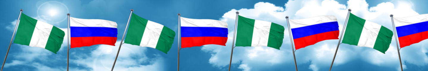 Naklejka na ściany i meble Nigeria flag with Russia flag, 3D rendering
