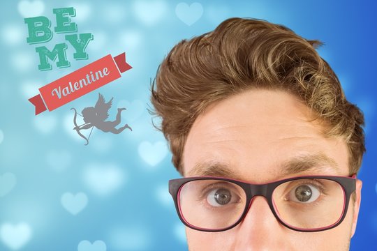 Digitally generated image of nerd man and valentine message