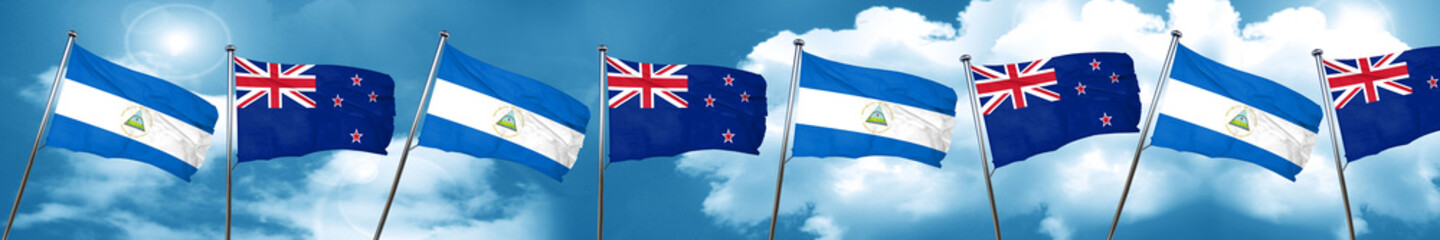 nicaragua flag with New Zealand flag, 3D rendering