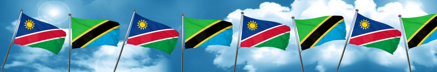 Namibia flag with Tanzania flag, 3D rendering