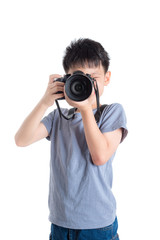 Fototapeta premium Little photographer taking photo over white background