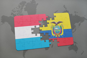 puzzle with the national flag of luxembourg and ecuador on a world map