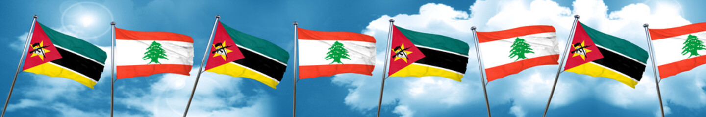 Fototapeta na wymiar Mozambique flag with Lebanon flag, 3D rendering