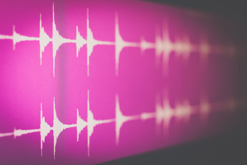 digital waveform on screen, music background. recording concept