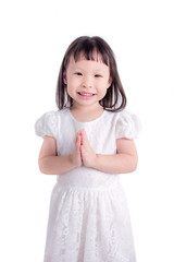 Little asian girl doing gesture welcome over white