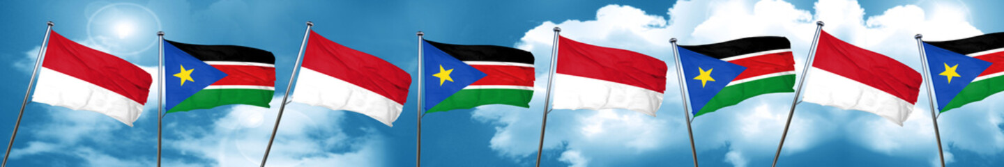 Fototapeta na wymiar monaco flag with South Sudan flag, 3D rendering