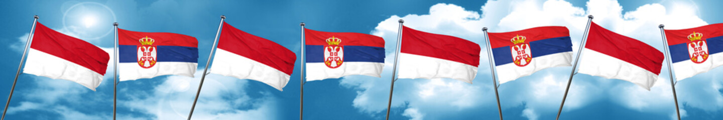 Fototapeta na wymiar monaco flag with Serbia flag, 3D rendering