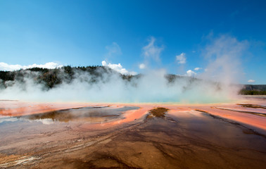 Grand Prismatic Spring during the day in the Midway Geyser Basin in Yellowstone National Park in Wyoming USA