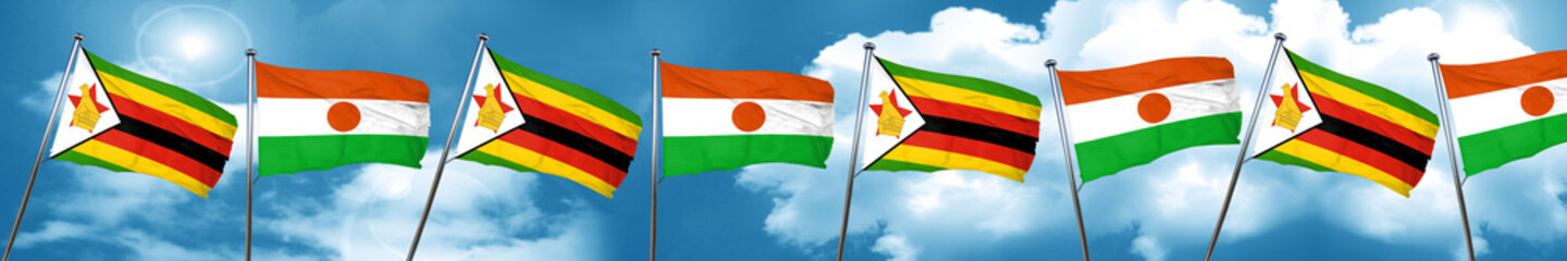Zimbabwe flag with Niger flag, 3D rendering