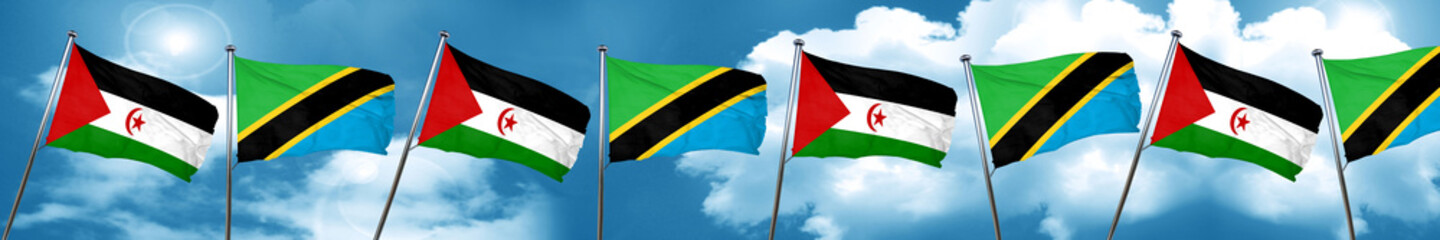Western sahara flag with Tanzania flag, 3D rendering