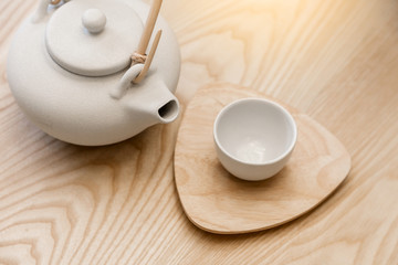 Fototapeta na wymiar asian tradition white ceramic set on wooden table background wit