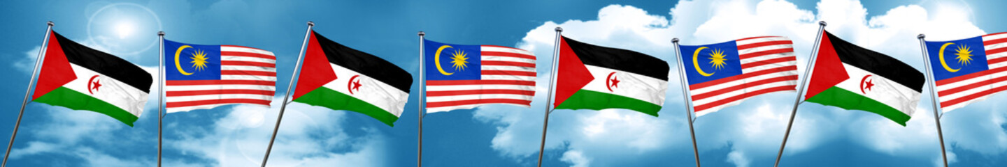 Western sahara flag with Malaysia flag, 3D rendering