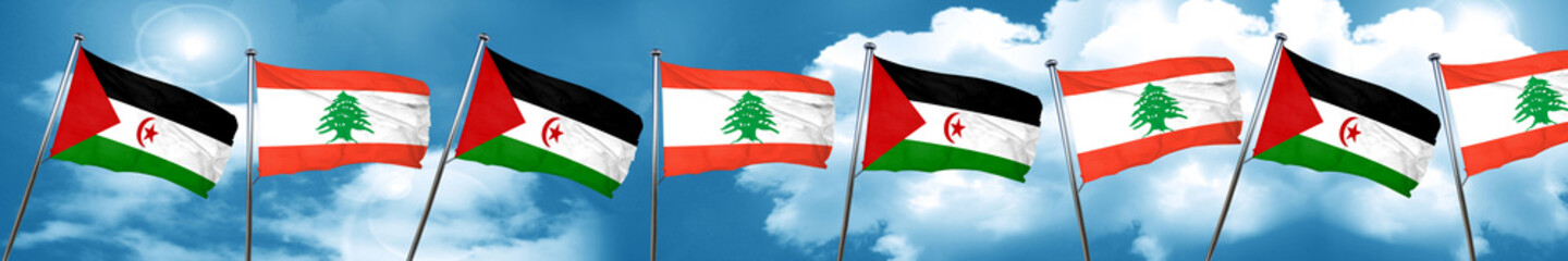 Fototapeta na wymiar Western sahara flag with Lebanon flag, 3D rendering