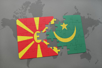 puzzle with the national flag of macedonia and mauritania on a world map