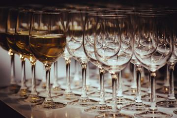 Lot of glasses with white wine
