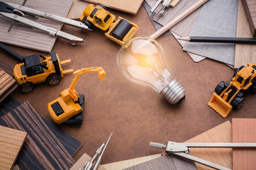 construction and design concept with toy car with wood sample ma