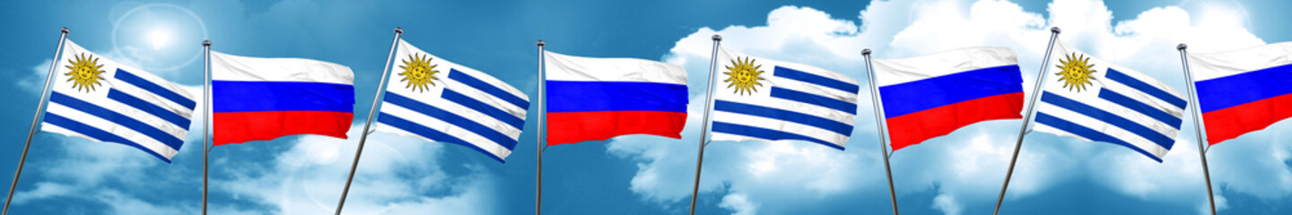 Uruguay flag with Russia flag, 3D rendering