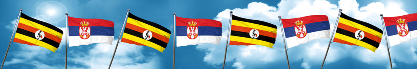 Uganda flag with Serbia flag, 3D rendering