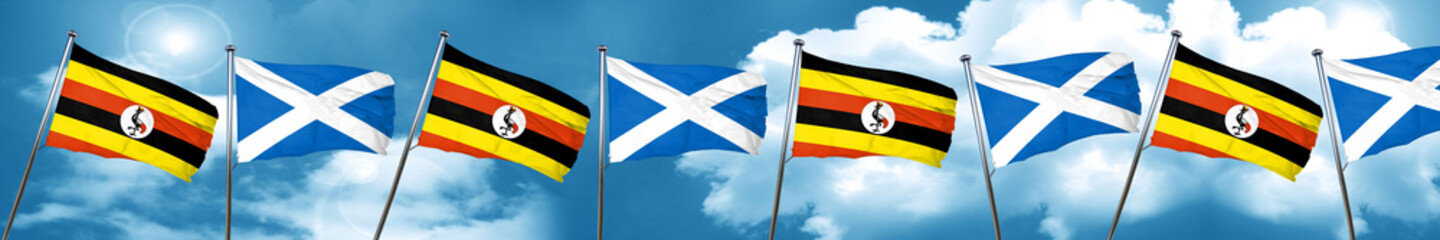Uganda flag with Scotland flag, 3D rendering