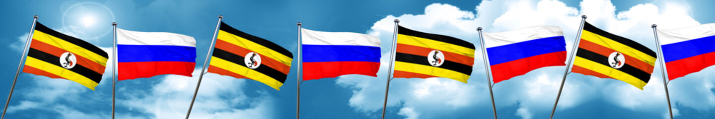 Uganda flag with Russia flag, 3D rendering