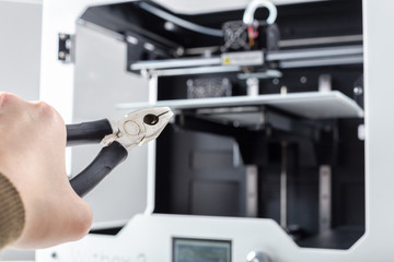 Designer Working With 3D Printer