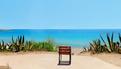 leisure armchair traveler on the beach with sea views