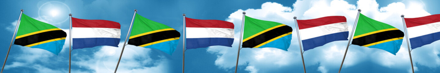 Tanzanian flag with Netherlands flag, 3D rendering