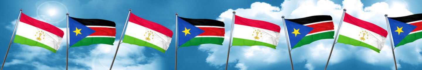 Fototapeta na wymiar Tajikistan flag with South Sudan flag, 3D rendering