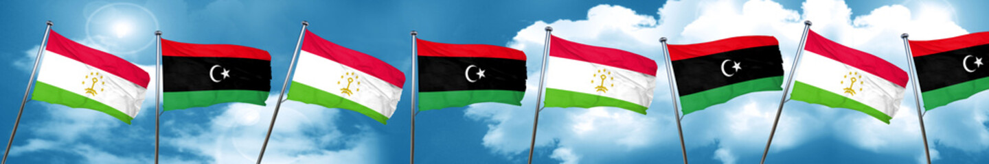 Fototapeta na wymiar Tajikistan flag with Libya flag, 3D rendering