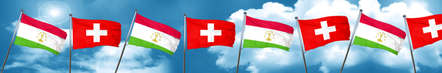 Tajikistan flag with Switzerland flag, 3D rendering