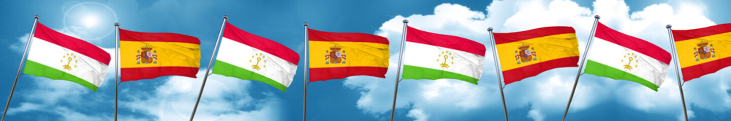 Fototapeta na wymiar Tajikistan flag with Spain flag, 3D rendering