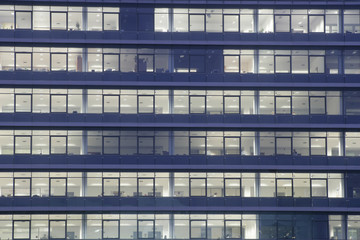 Modern office building facade at night