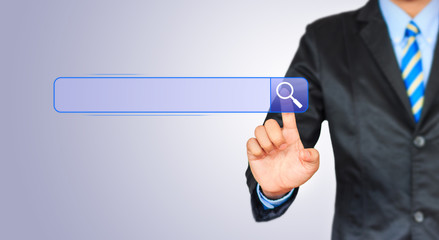 Business man pushing search botton on a touch screen interface