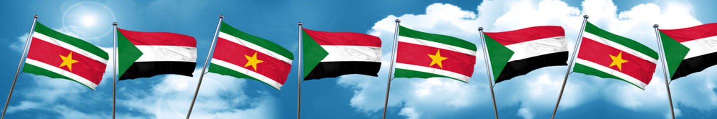 Suriname flag with Sudan flag, 3D rendering