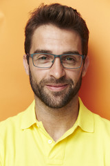 Smiling man in spectacles, portrait