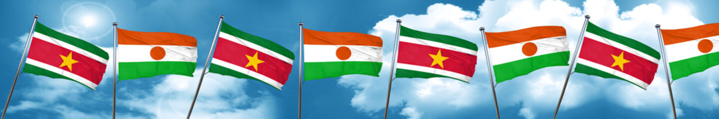 Fototapeta na wymiar Suriname flag with Niger flag, 3D rendering