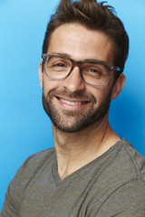 Smiling man in glasses, portrait