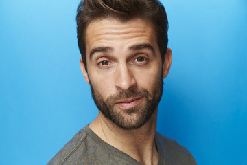 Smug dude looking at camera