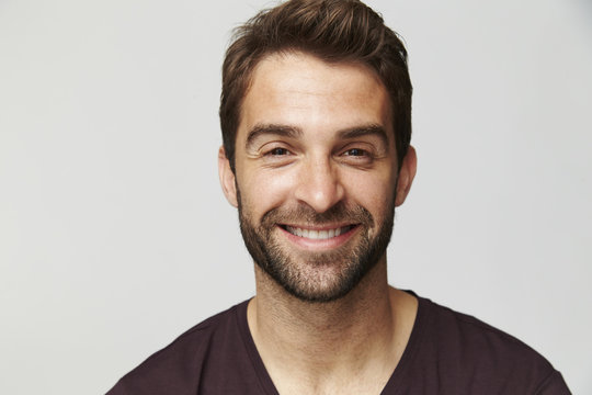 Happy fellow in studio, portrait