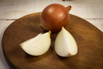 Sliced fresh onion on chopping board