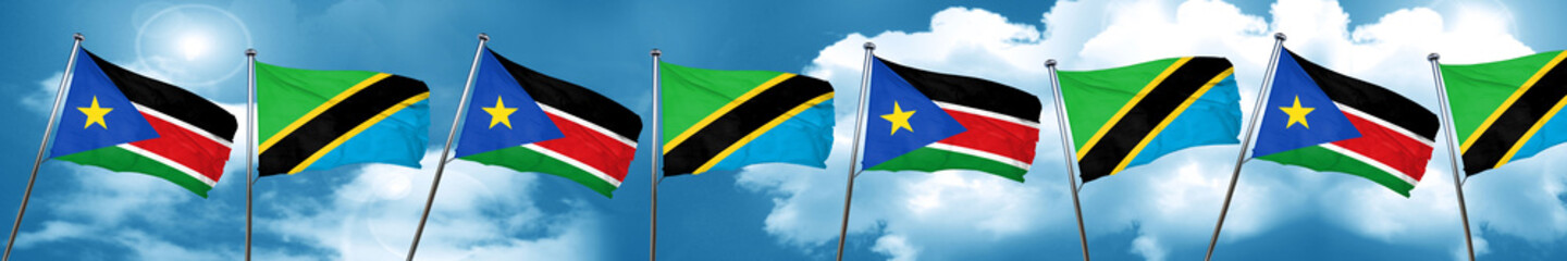 south sudan flag with Tanzania flag, 3D rendering