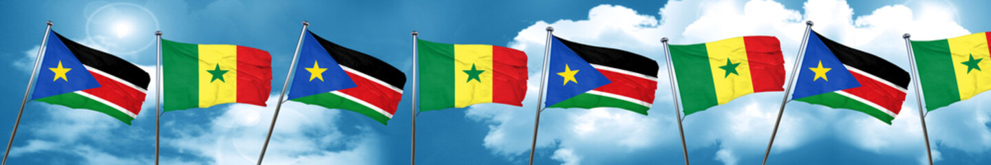 south sudan flag with Senegal flag, 3D rendering