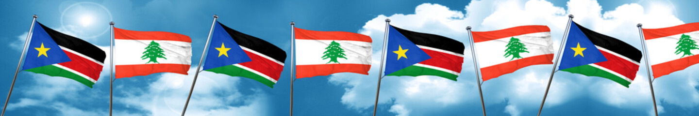 south sudan flag with Lebanon flag, 3D rendering