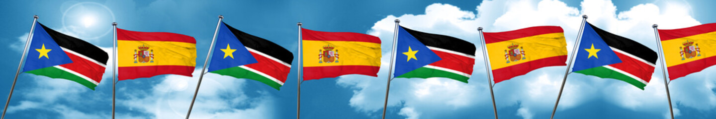 south sudan flag with Spain flag, 3D rendering