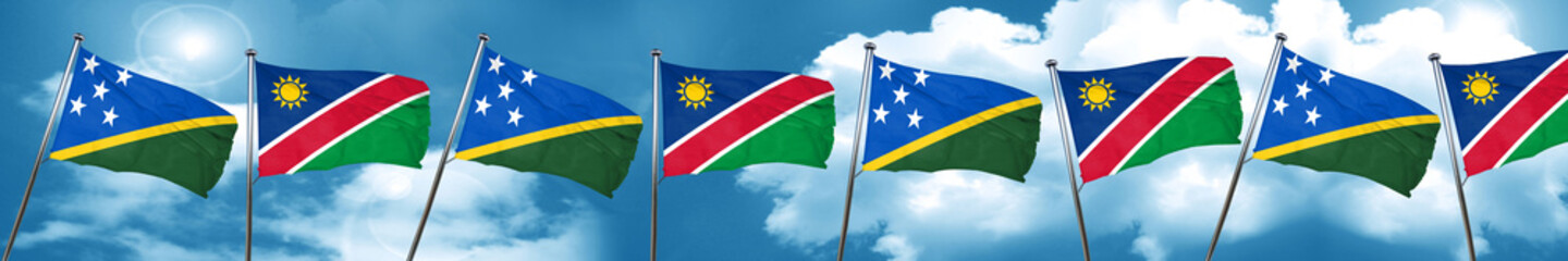 Solomon islands flag with Namibia flag, 3D rendering