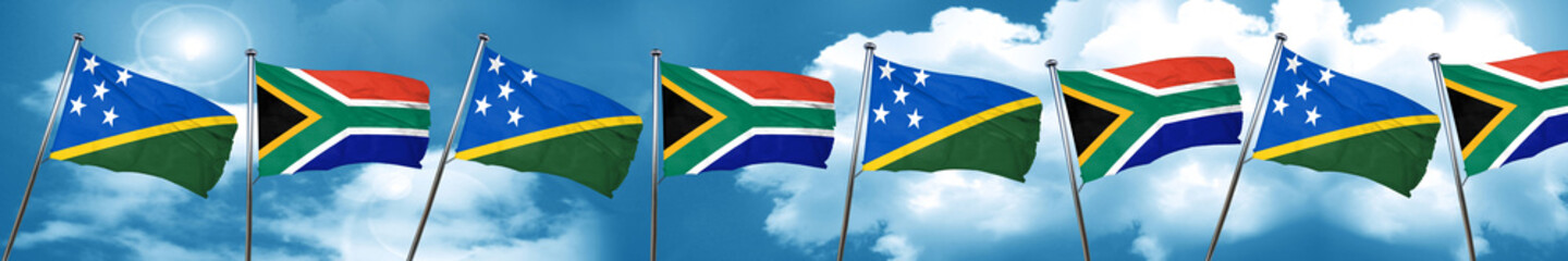 Solomon islands flag with South Africa flag, 3D rendering