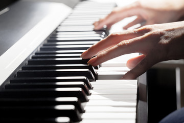 Fototapeta na wymiar Playing Piano. close up