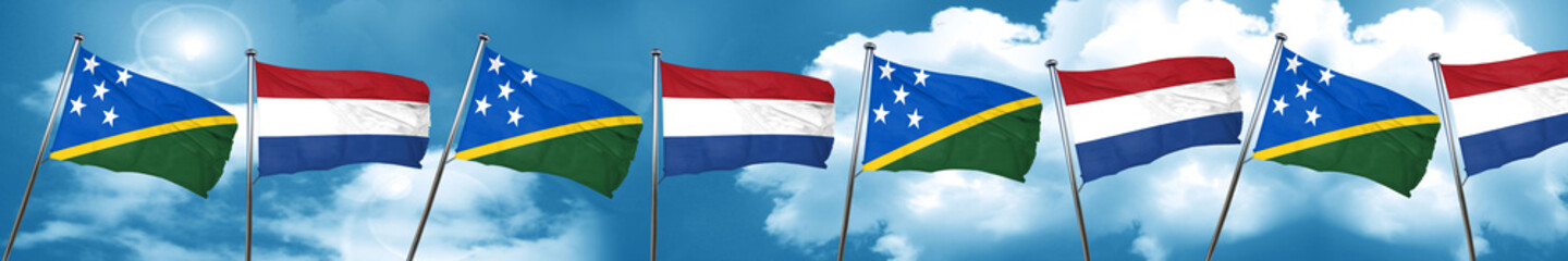 Solomon islands flag with Netherlands flag, 3D rendering