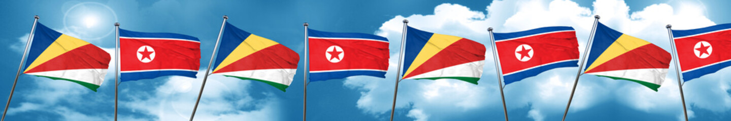 seychelles flag with North Korea flag, 3D rendering