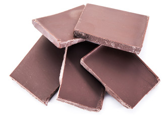 Pieces of chocolate bar isolated on a white background.